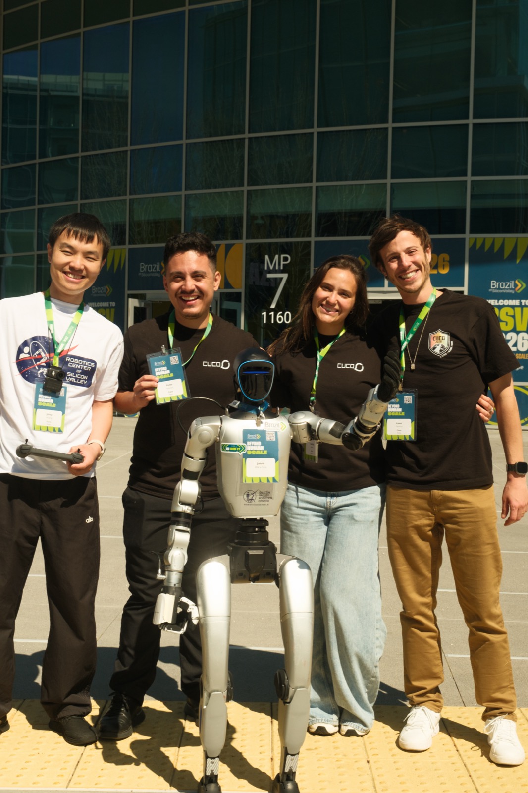SVRC team of four with Unitree G1 at BSV 2026 conference venue