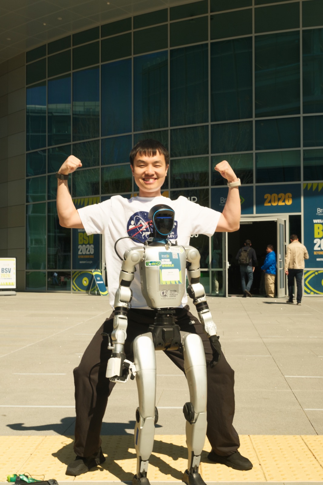 Jerry Huang, Founder and CEO, with Unitree G1 humanoid robot