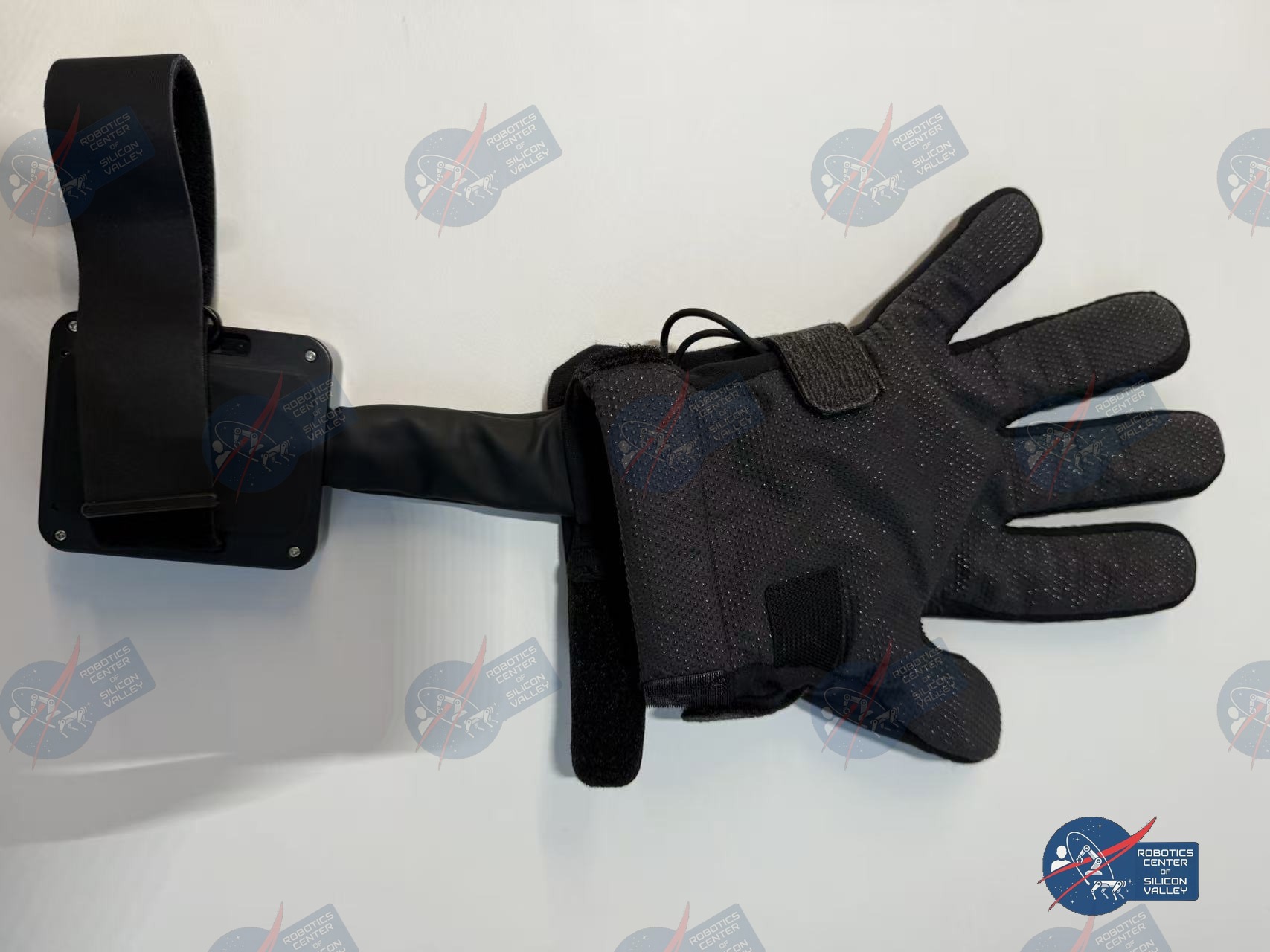 Wuji Glove — front view showing sensor pod and glove body